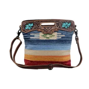 AZURE PETALS HAND TOOLED BAG.