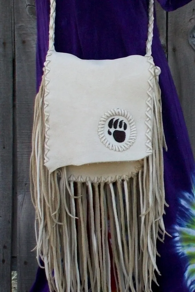 Fringed leather handbag with bear paw totem, totem handbag