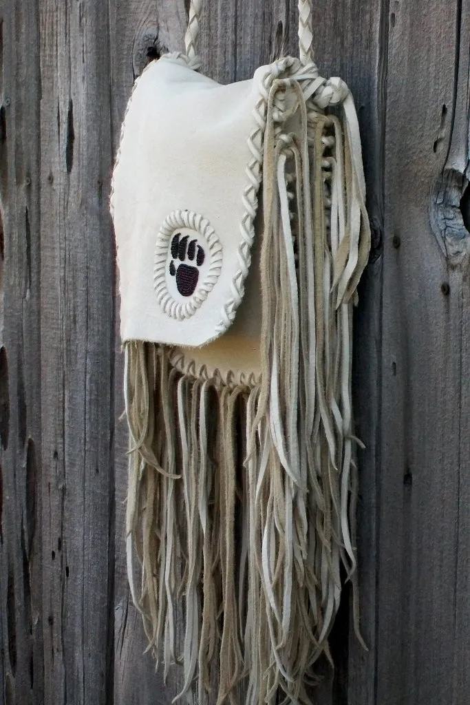 Fringed leather handbag with bear paw totem, totem handbag