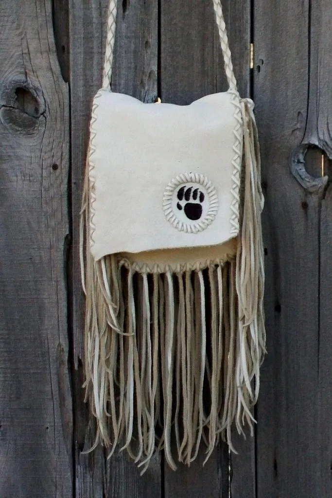 Fringed leather handbag with bear paw totem, totem handbag