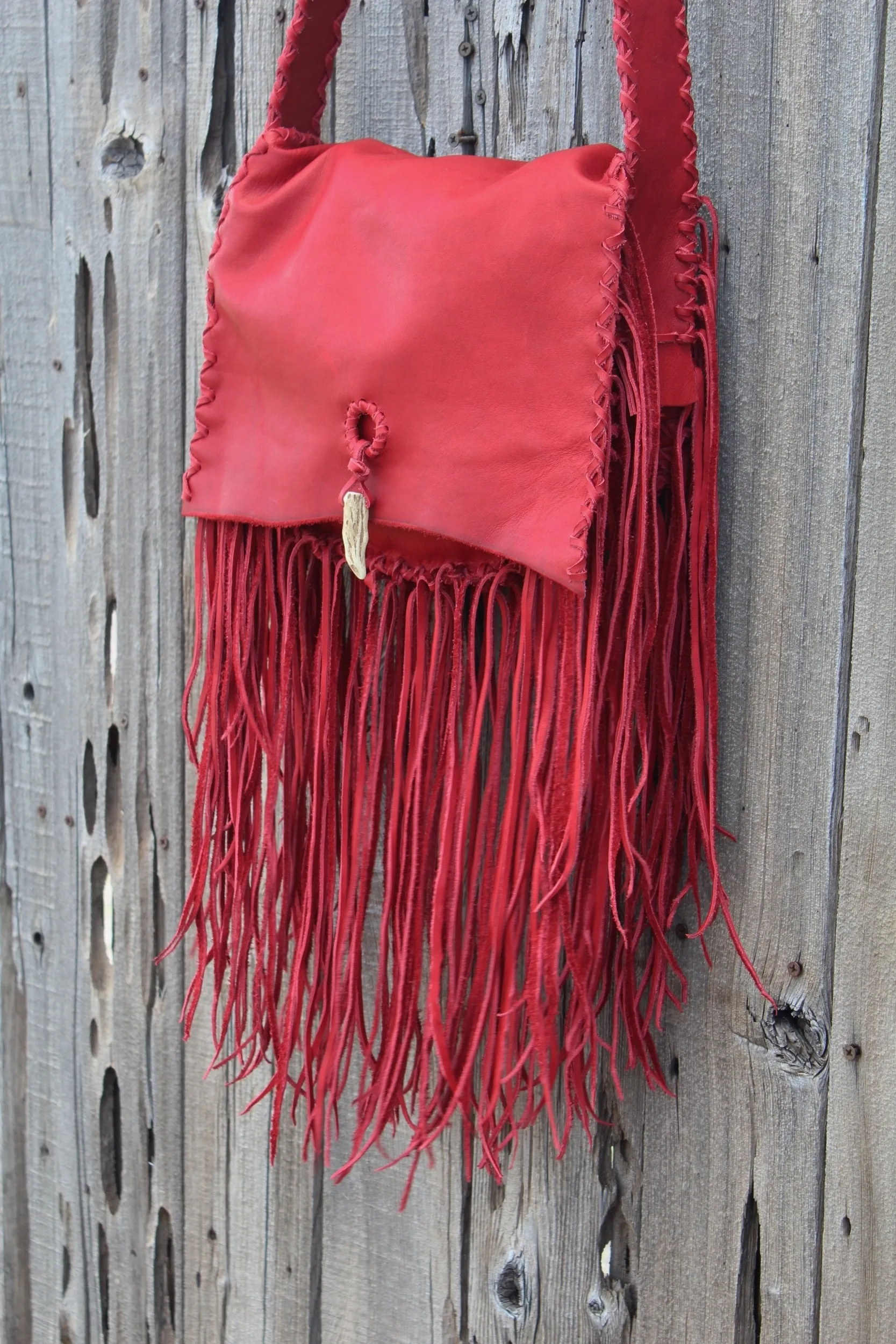 Fringed red leather handbag, soft leather bag