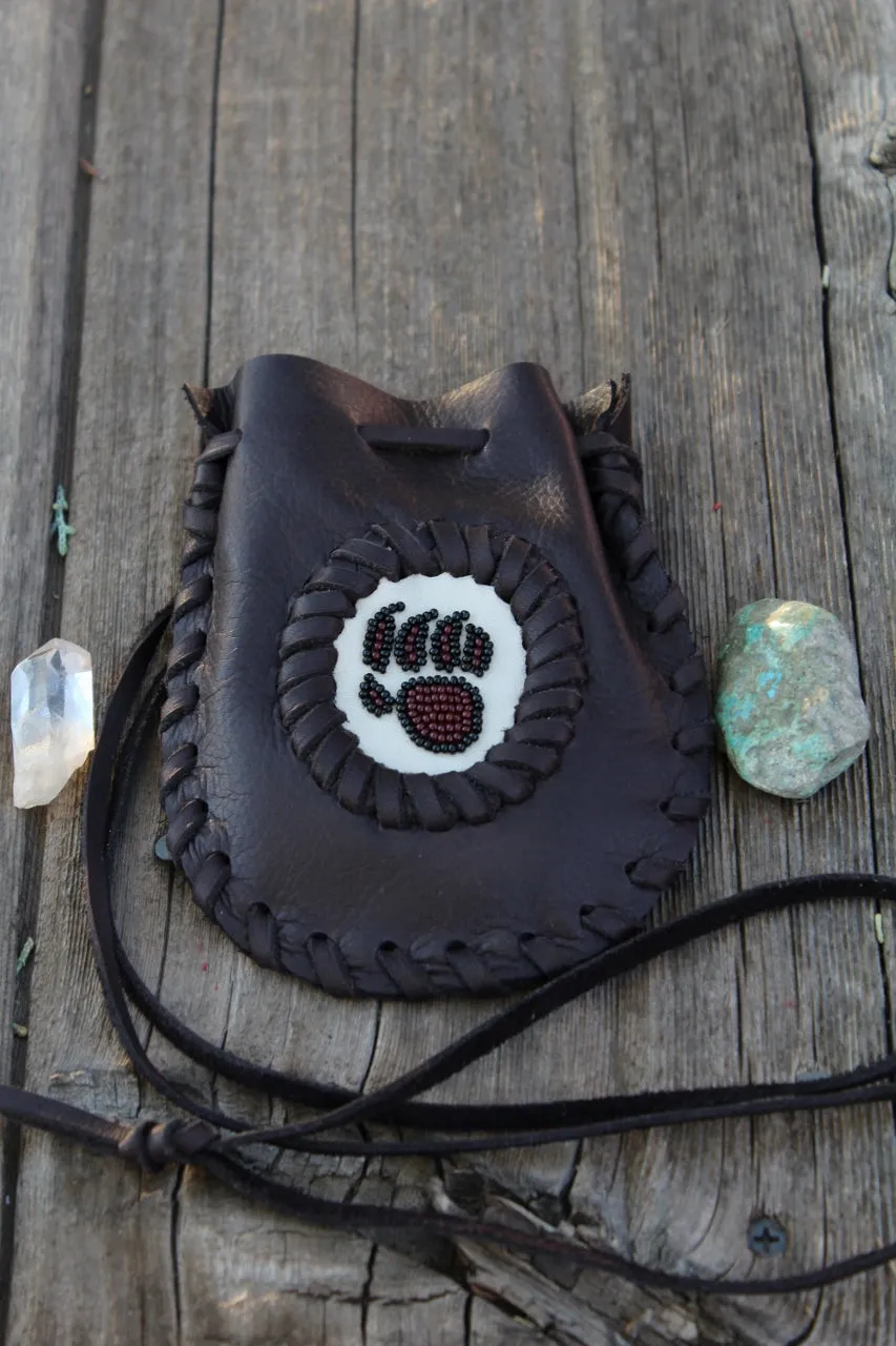 Leather medicine bag, beaded bear paw bag