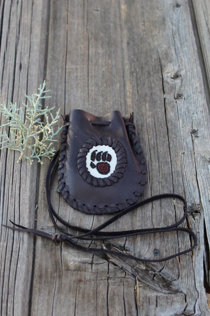 Leather medicine bag, beaded bear paw bag