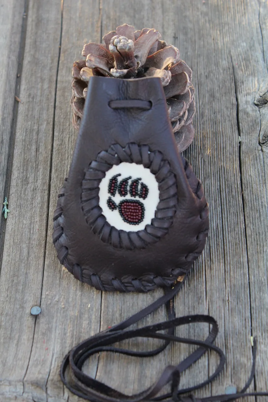 Leather medicine bag, beaded bear paw bag