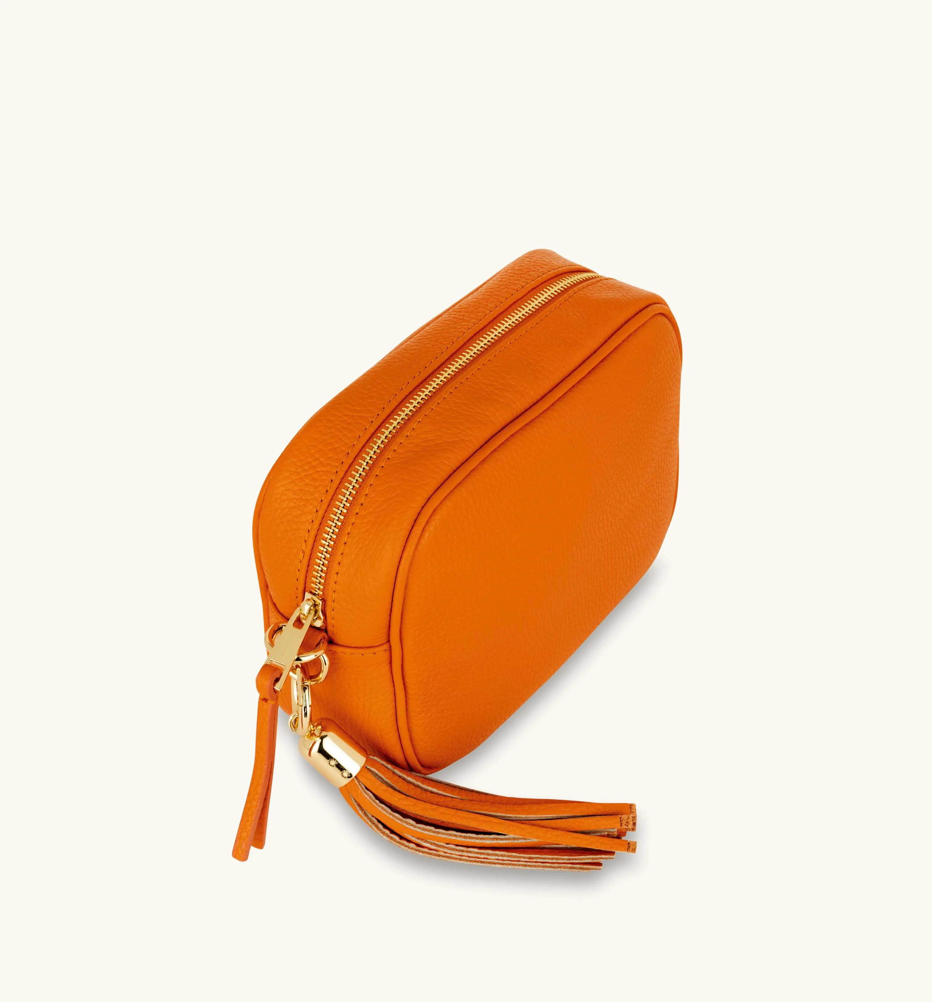 The Tassel Orange Leather Crossbody Bag With Gold Chain Strap