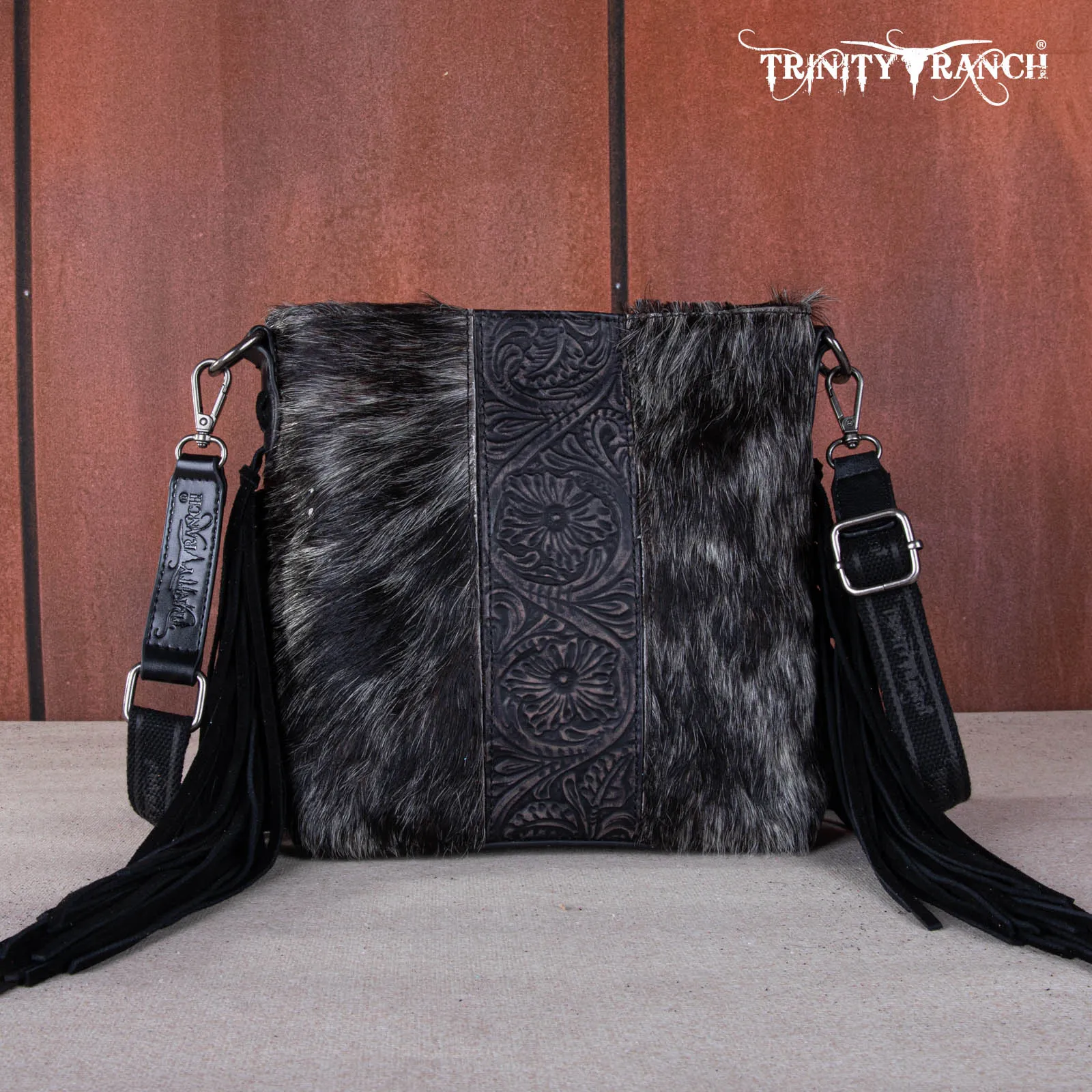 TR159G-9360   Trinity Ranch Hair-On Cowhide/Tooled Fringe Concealed Carry Crossbody Bag