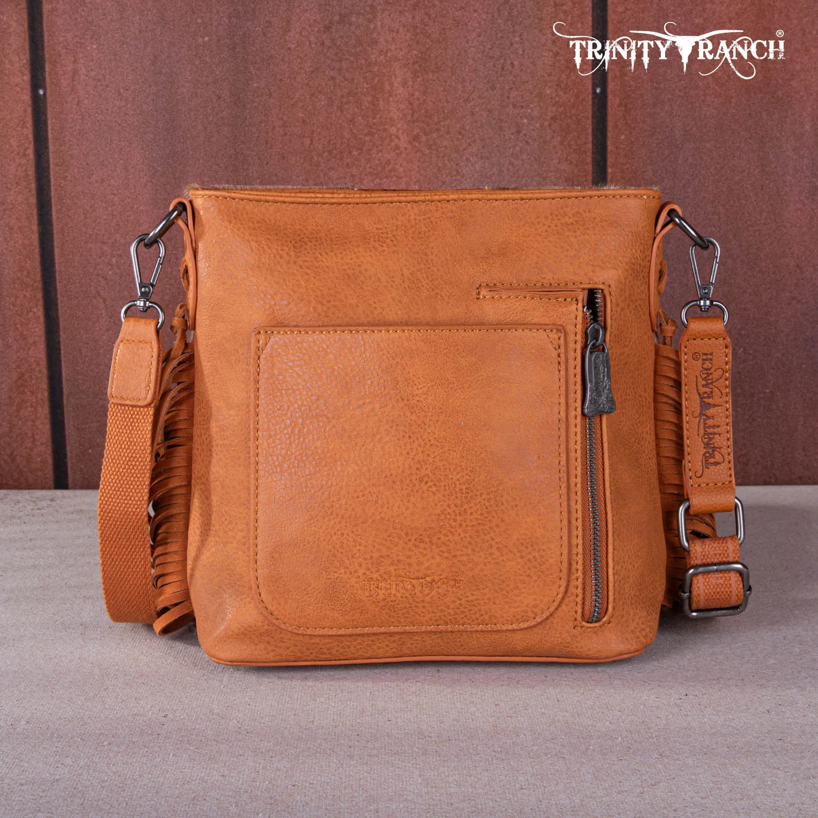 TR159G-9360   Trinity Ranch Hair-On Cowhide/Tooled Fringe Concealed Carry Crossbody Bag