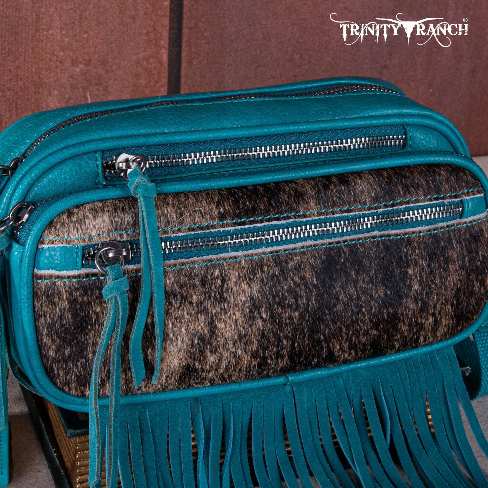 TR165-197  Trinity Ranch Genuine Hair-On Cowhide Triple Zippered Pocket Fringe Belt Bag