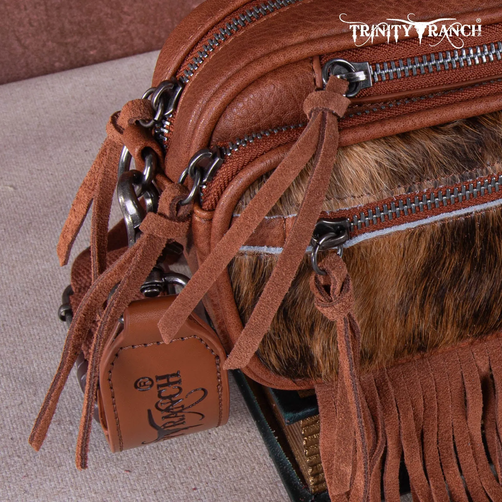 TR165-197  Trinity Ranch Genuine Hair-On Cowhide Triple Zippered Pocket Fringe Belt Bag