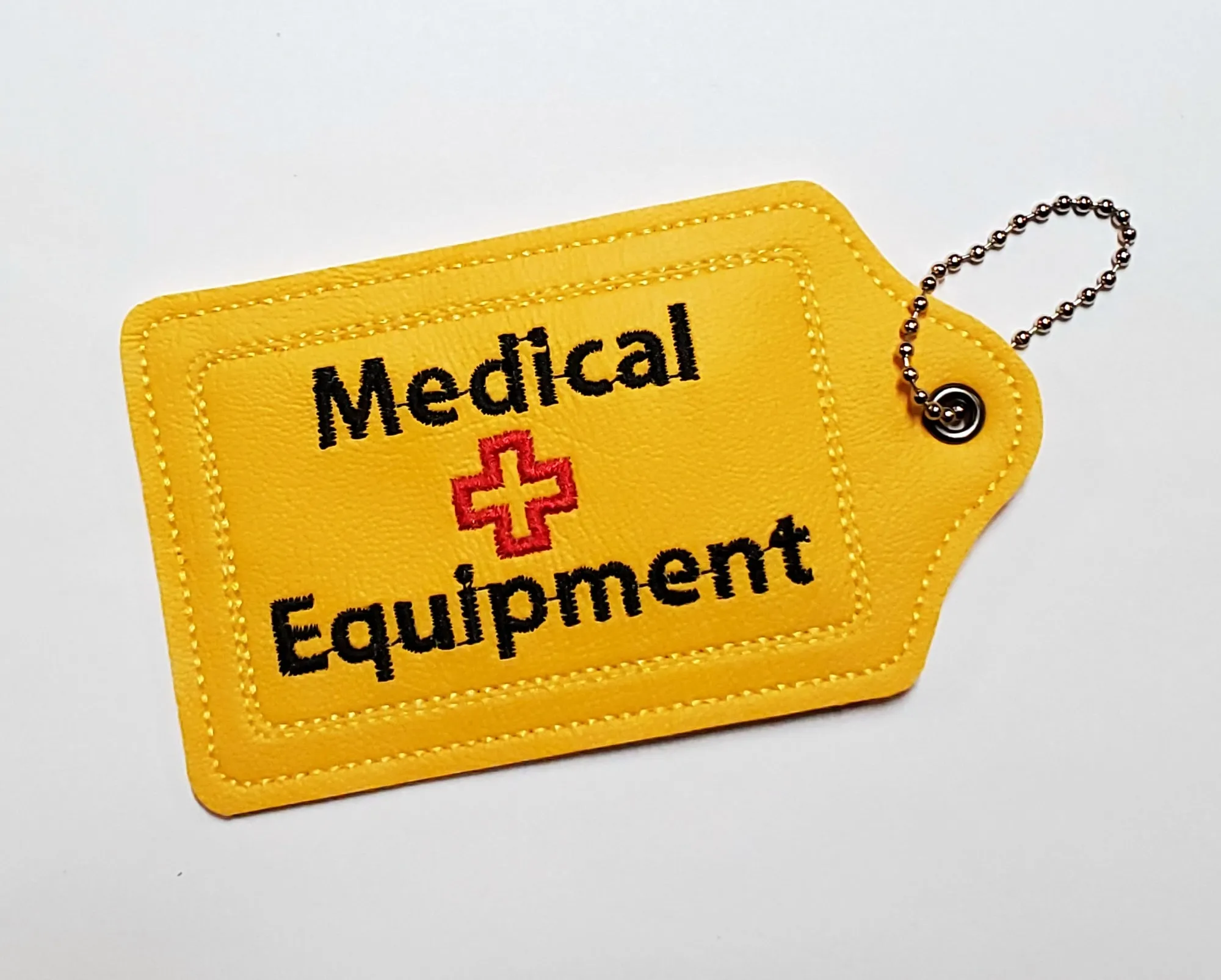 Yellow Medical Equipment Luggage Tag